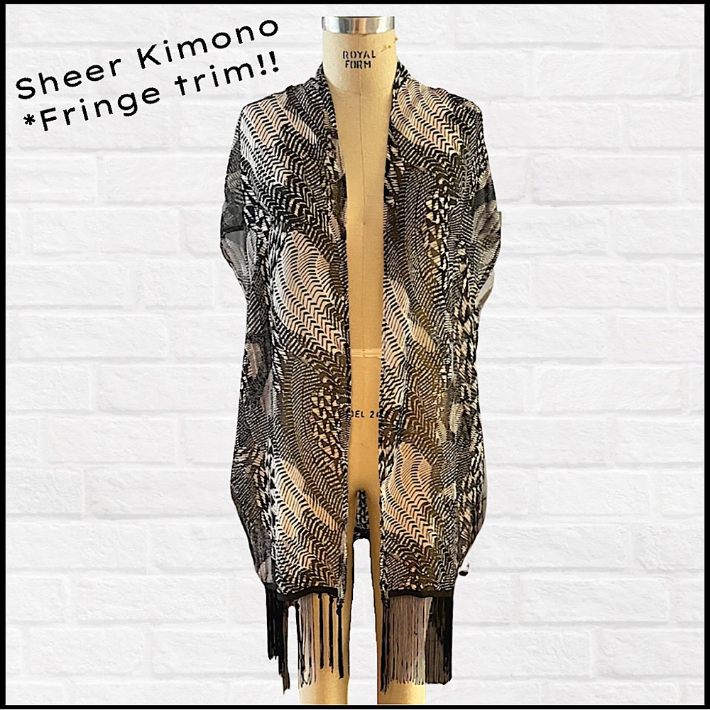 Never worn, fun & edgy, sheer kimono w/ fringe trim.